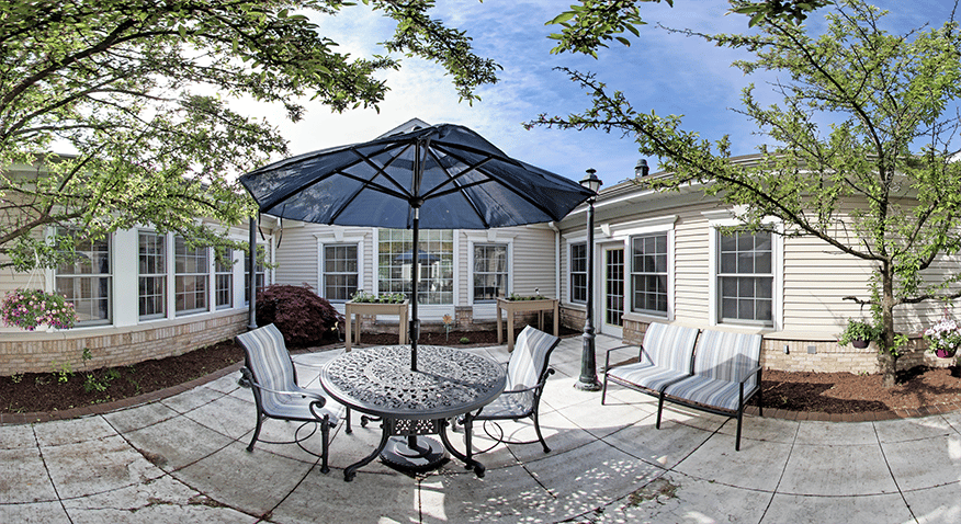 Outdoor courtyard with seating and a gazebo