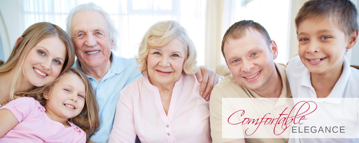 Cambrian Senior Living, assisted living in South Lyon, MI — Family portrait with seniors and children in a cozy setting