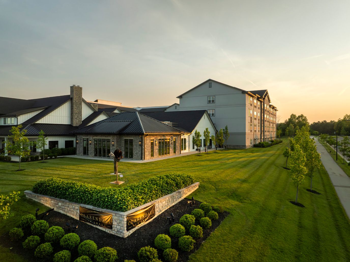 Exterior view of Clarendale Ann Arbor with landscaped gardens