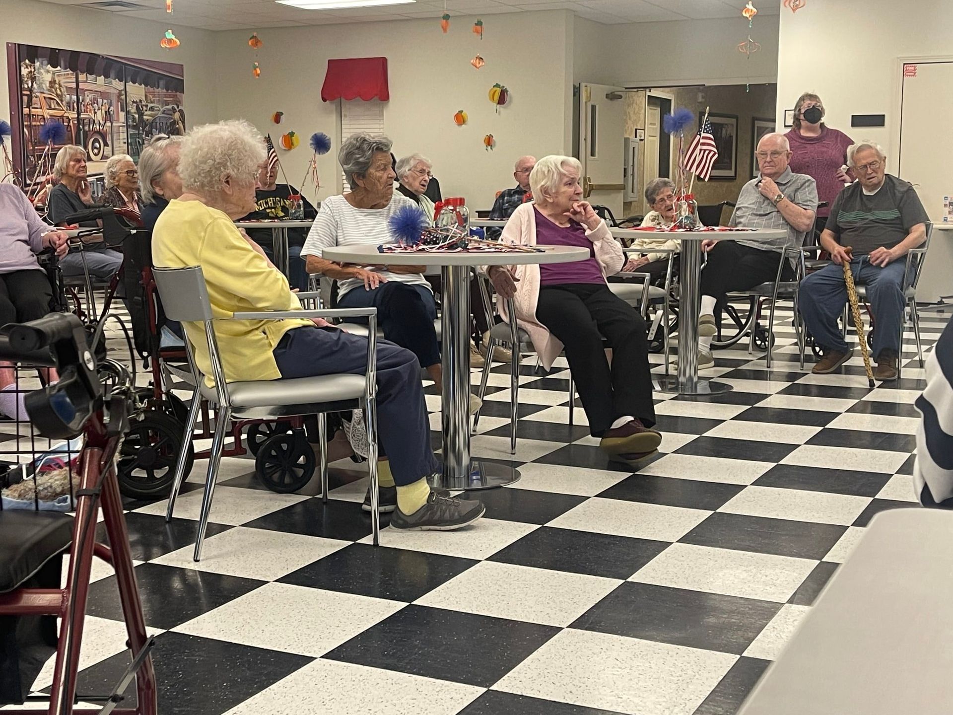 Residents engaged in conversation in a common area