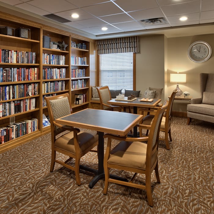 Interior library area with seating and bookshelves