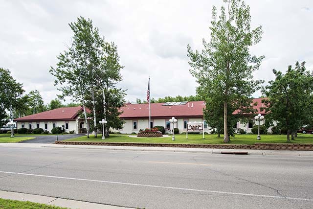 Exterior view of Goldpine Home with landscaping