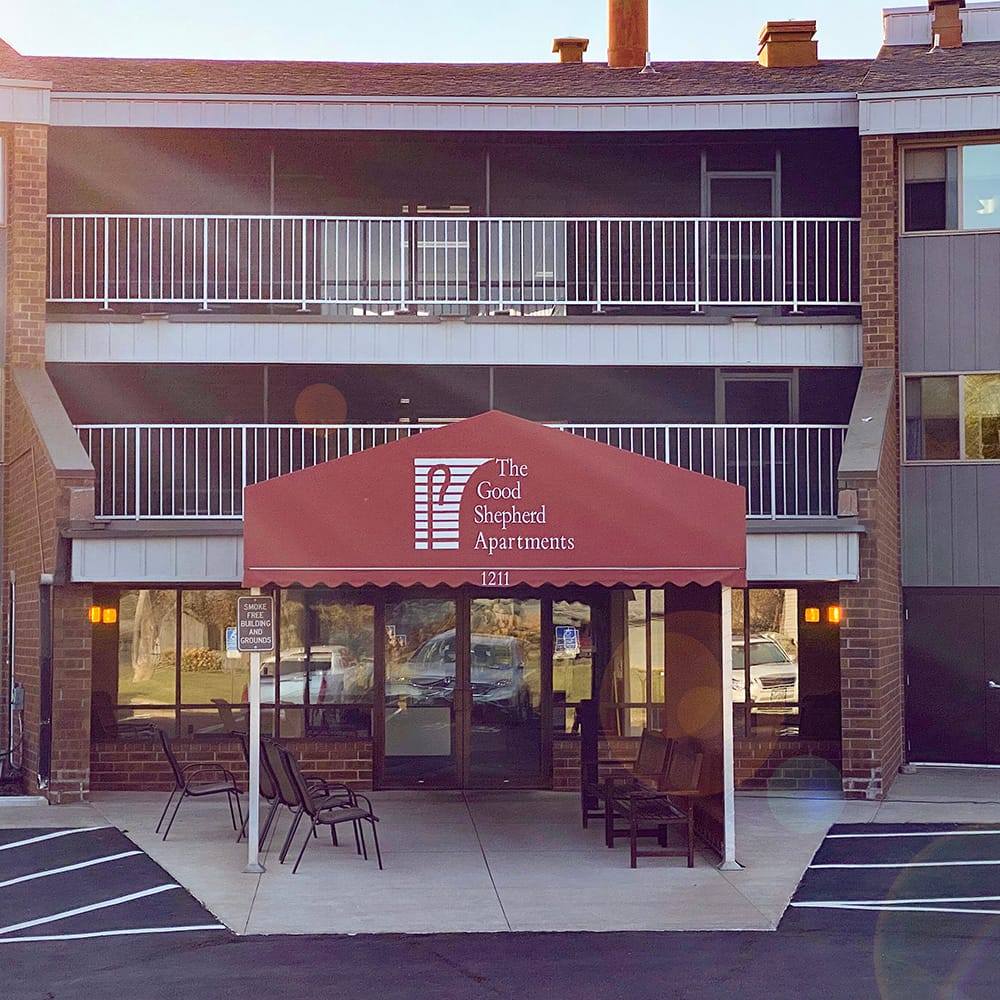Entrance of Good Shepherd Apartments with awning