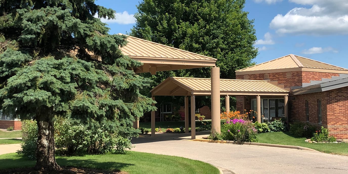 Exterior view of the entrance of Field Crest Assisted Living