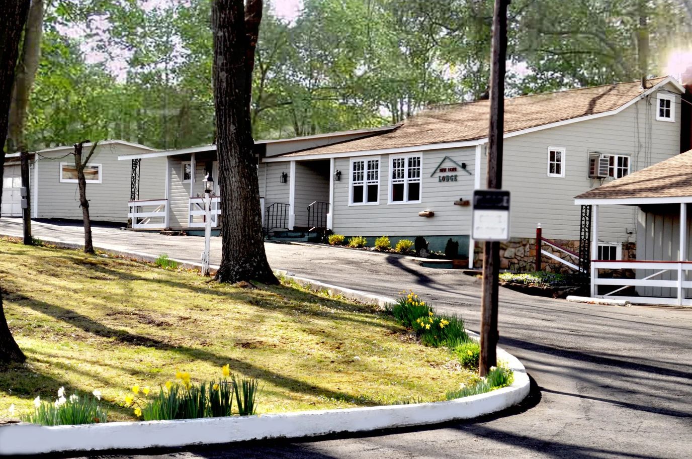 Exterior view of The Lodge of New Hope with gardens