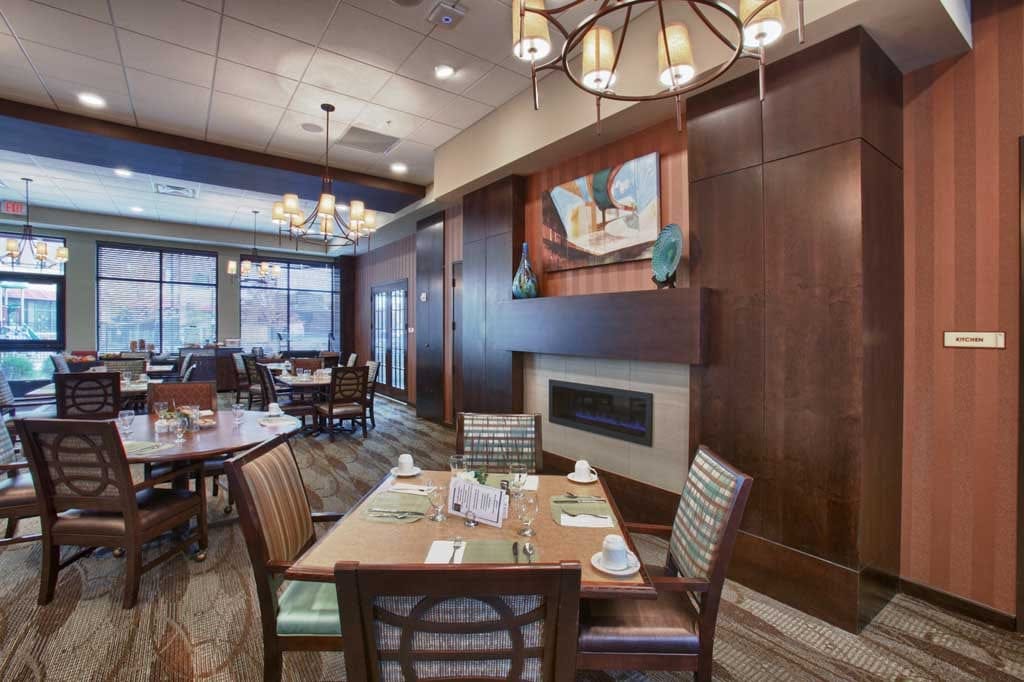 Elevated dining room with tables and decor