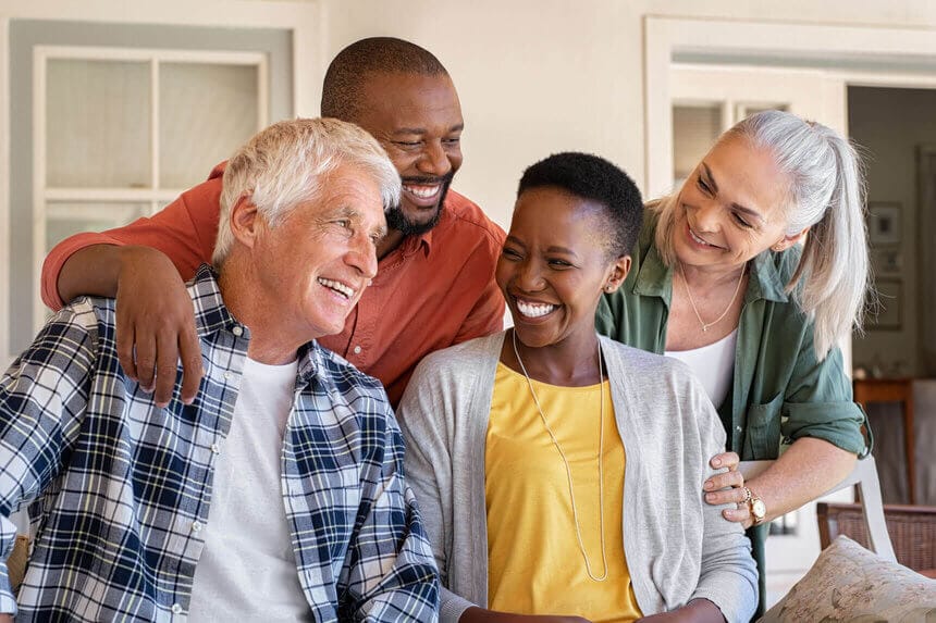 Good Samaritan Society – Forest City, Nursing Home — Group of smiling residents enjoying each other's company