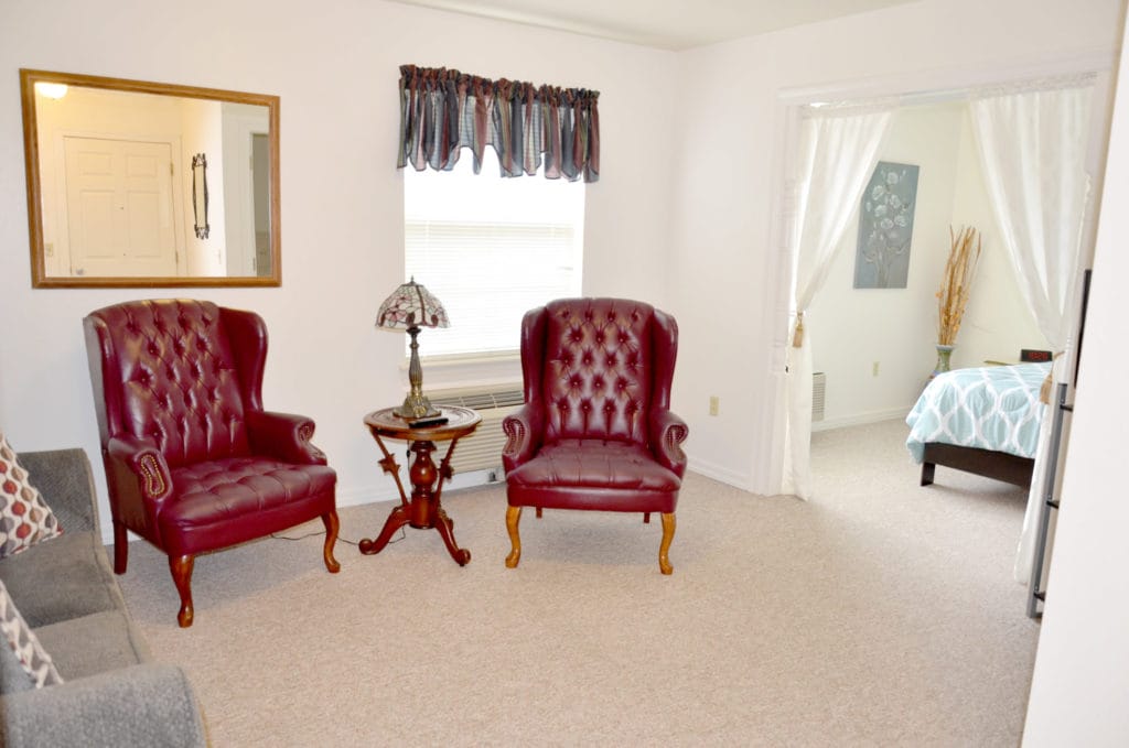 Cozy living area with chairs and decor