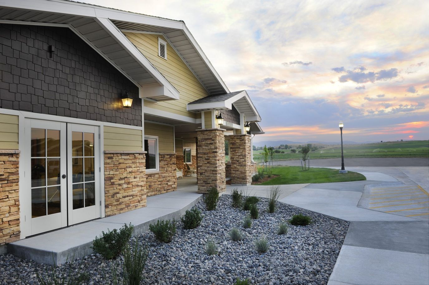 Exterior view of the facility at sunset