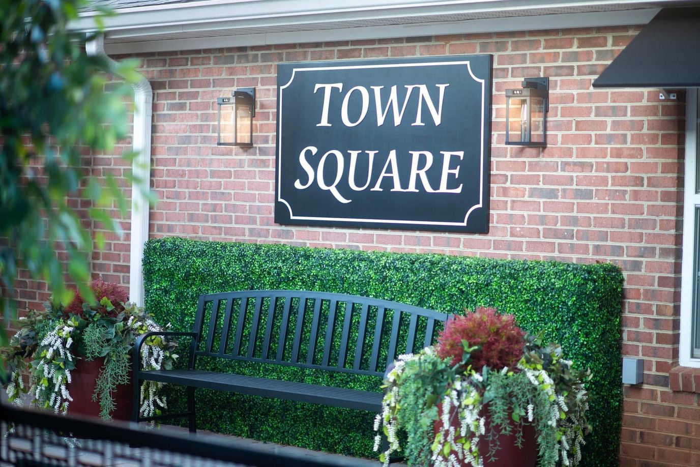 Sign for Town Square area outside the facility