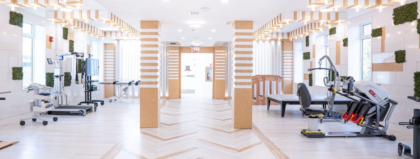 Bright and modern rehabilitation room with equipment