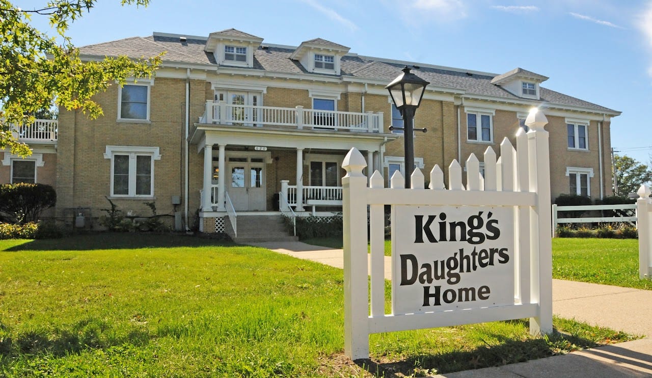 Exterior view of King's Daughters Home with sign.