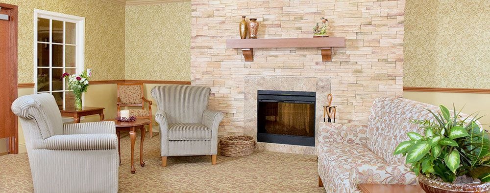 Interior lounge area with a fireplace and seating