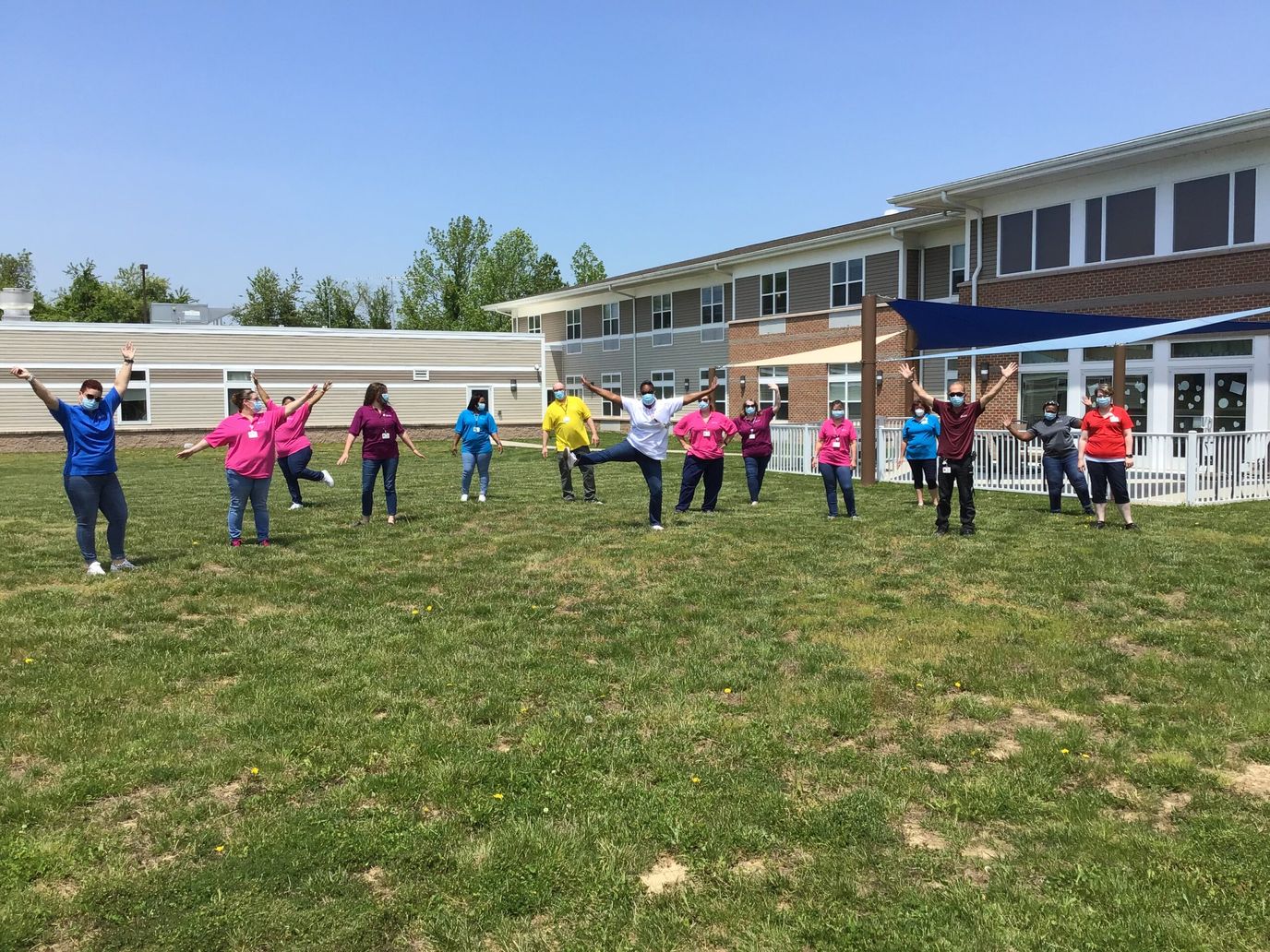 Staff and residents participating in outdoor activities