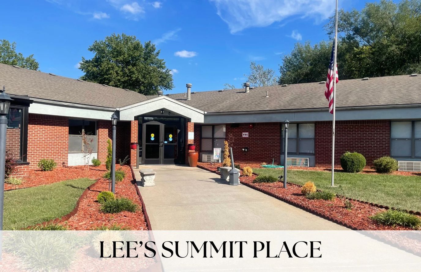 Exterior view of Lee’s Summit Place with landscaping