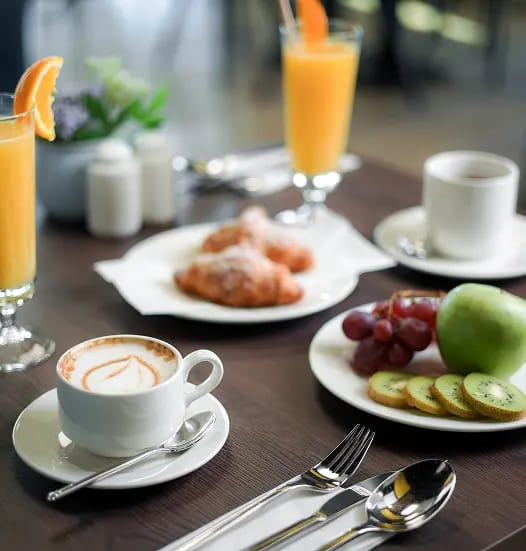 A table set with meals and beverages