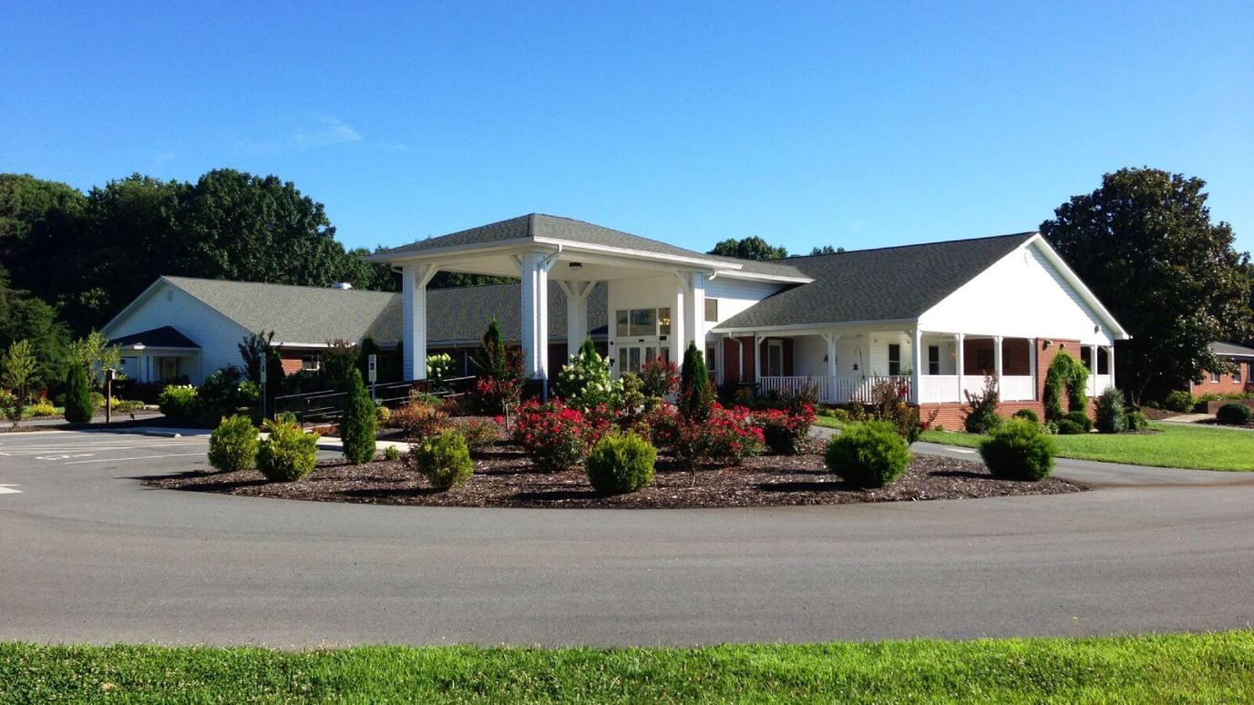 Exterior view of Vienna Village with landscaping