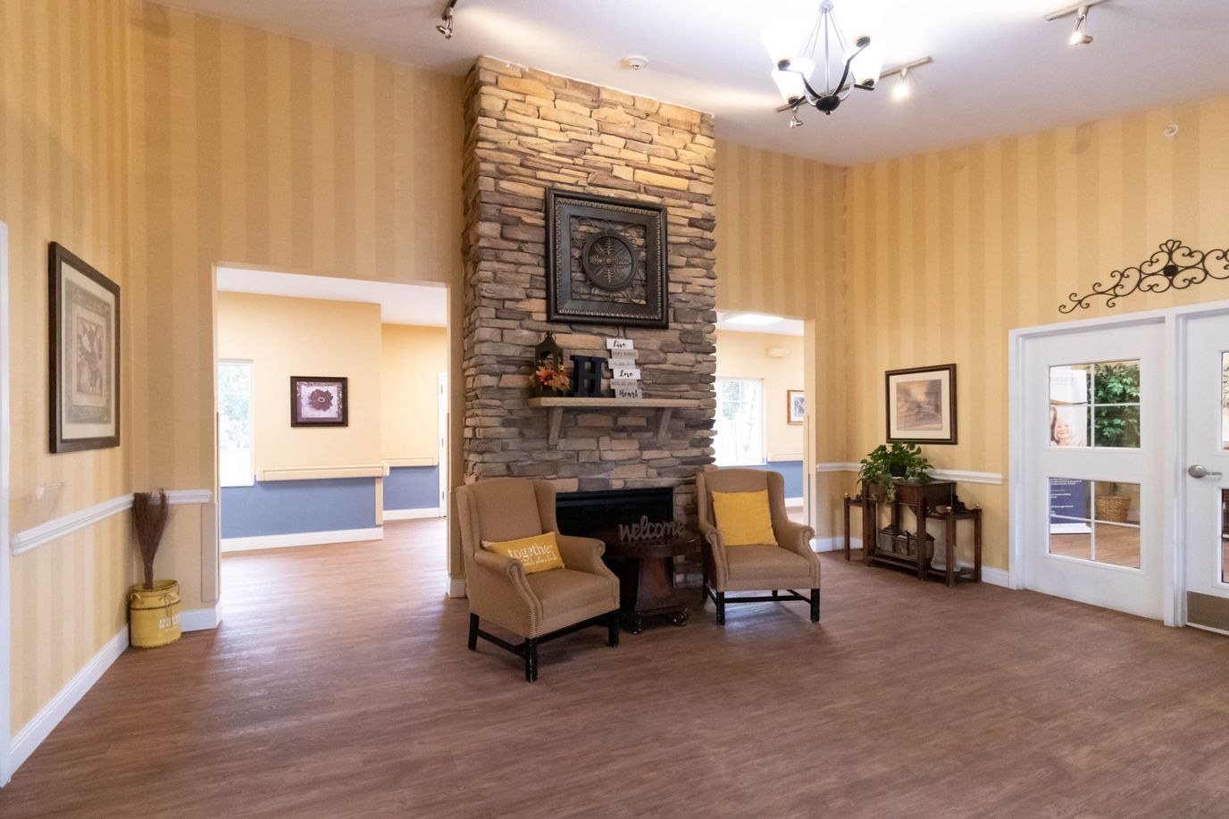The Hermitage, assisted living in Sylva, NC — Cozy sitting area with stone fireplace and decorative features