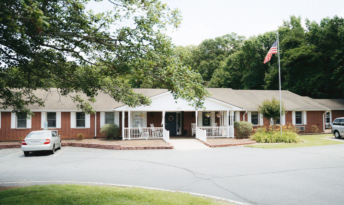 Exterior view of Piedmont Christian Home with American flag