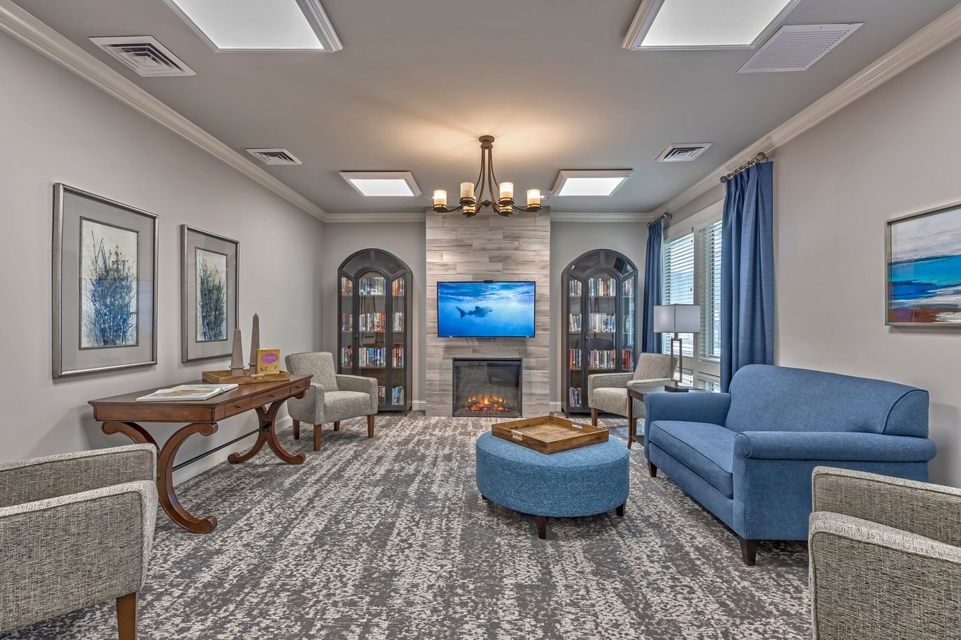 Cozy common area with seating and a TV