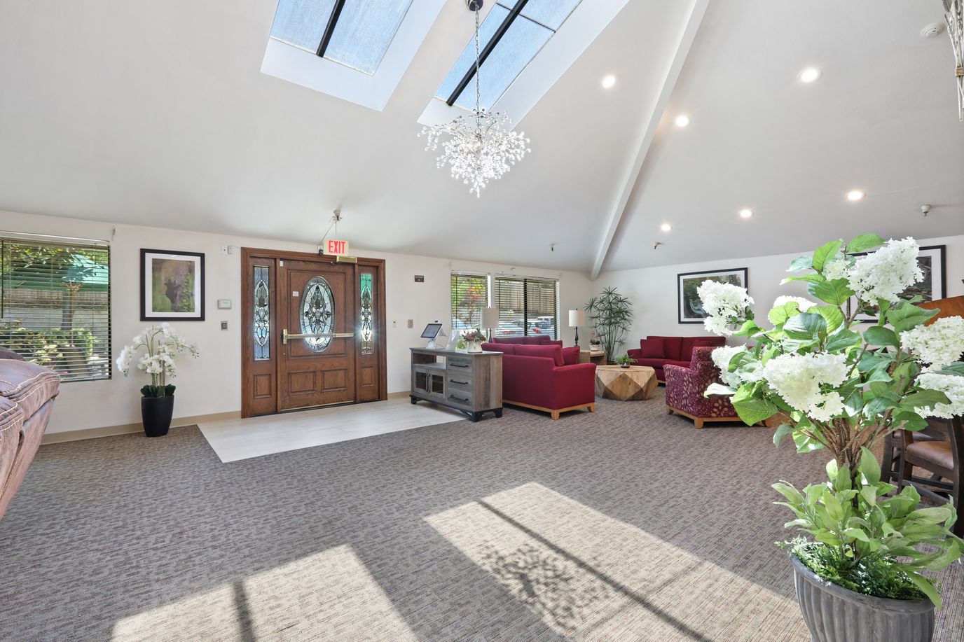 Bright and welcoming common area with seating and decor.