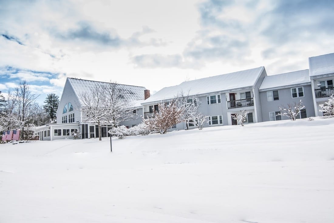 Facility exterior covered in snow during winter