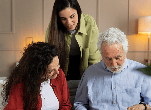 Staff engaging with residents during an activity