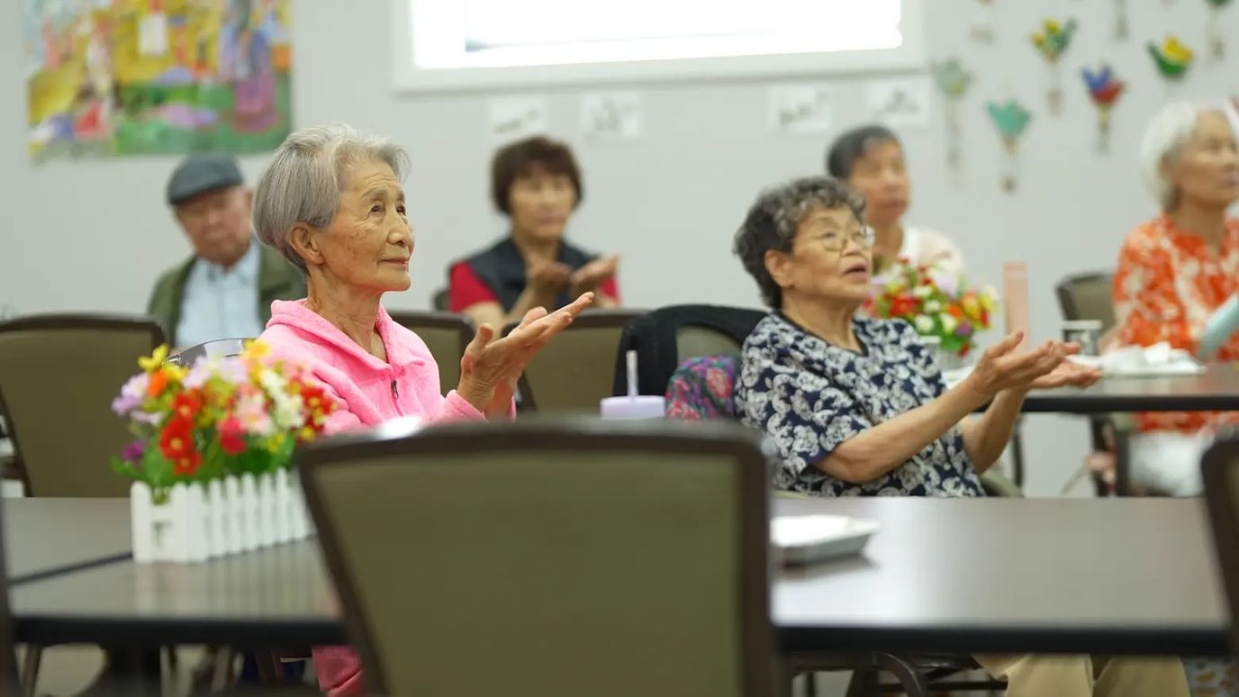 Residents engaged in an activity session in a common area