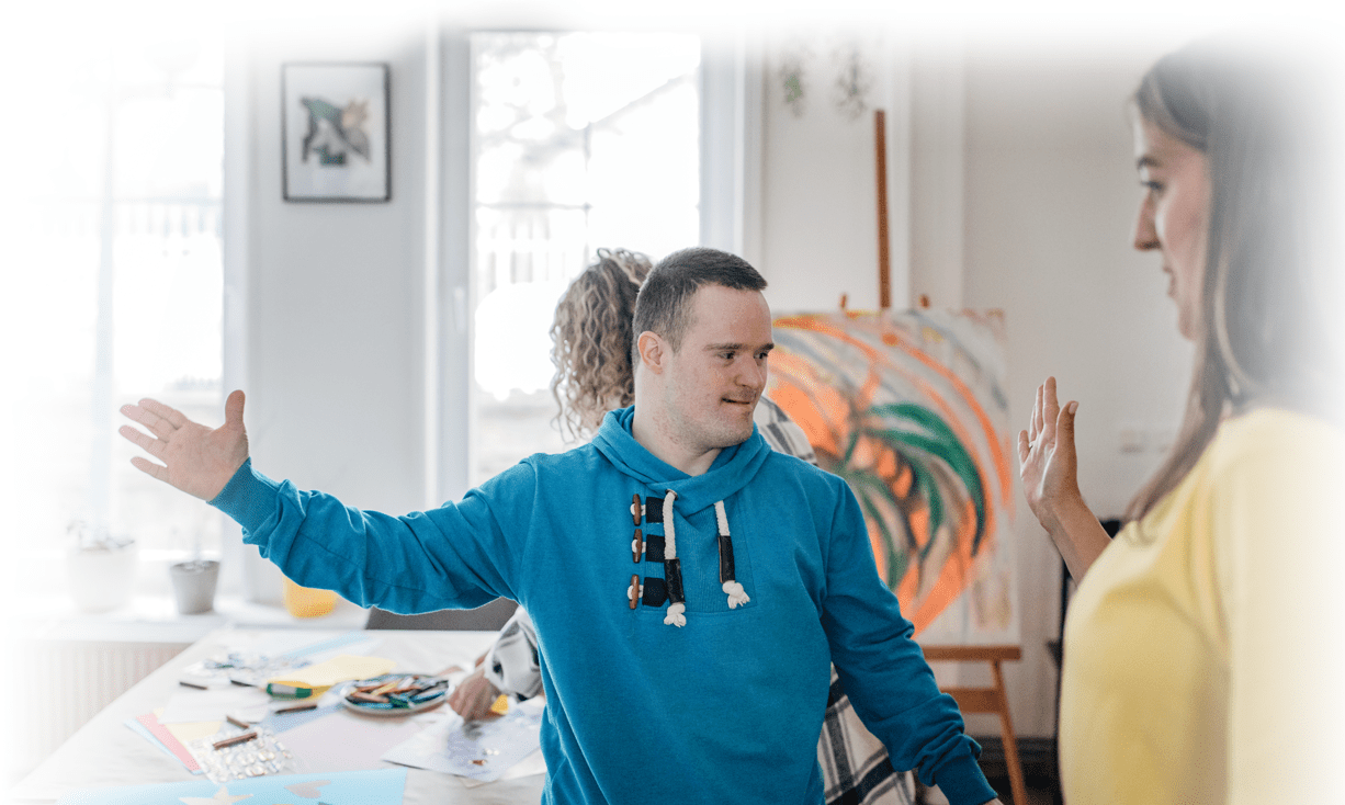 Residents engaging in an art activity indoors