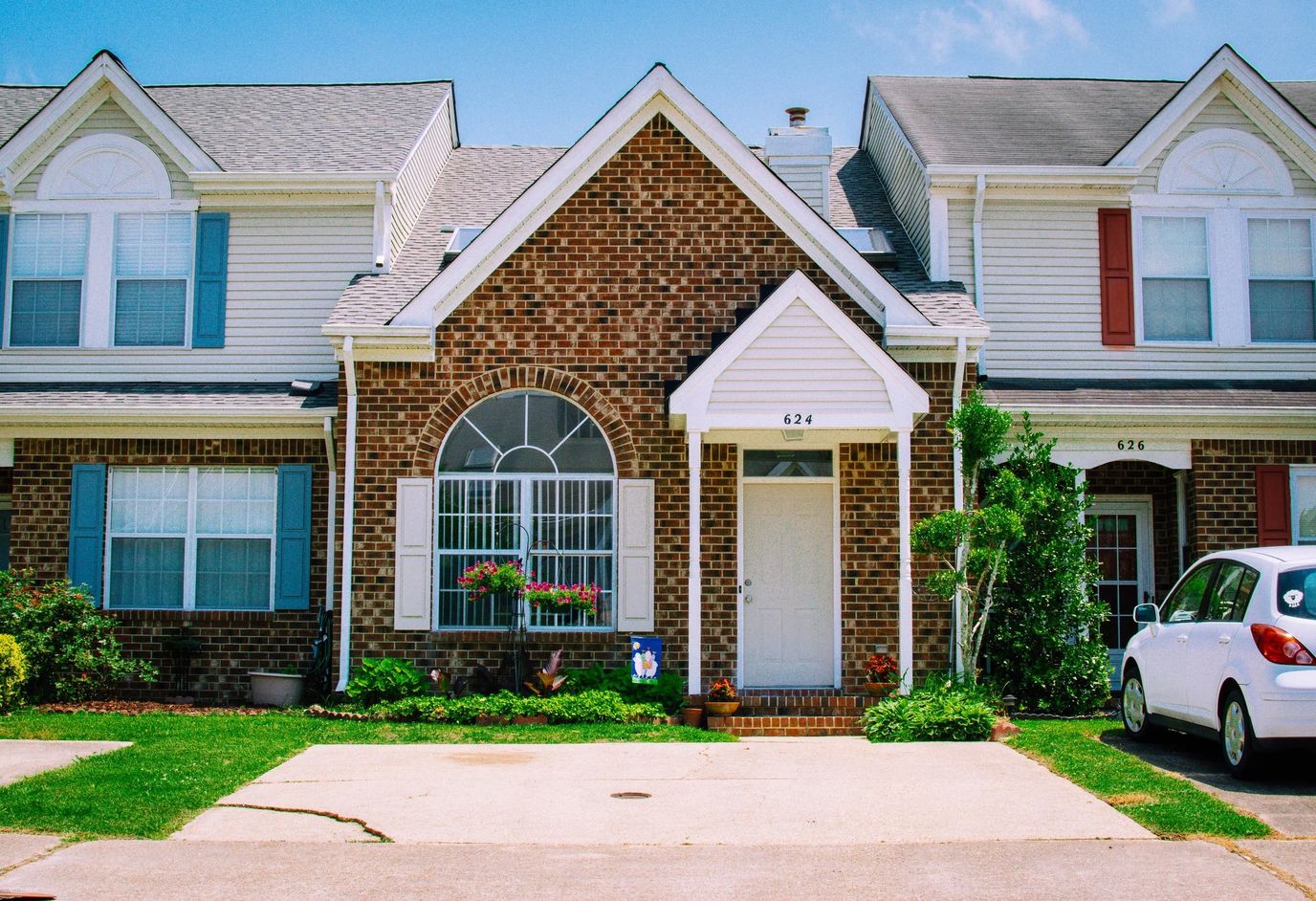 Exterior of a senior living facility with gardens