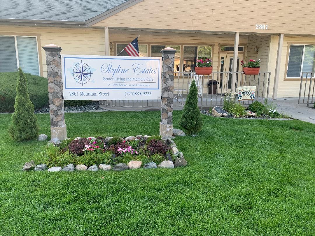 Exterior view of Skyline Estates with a sign