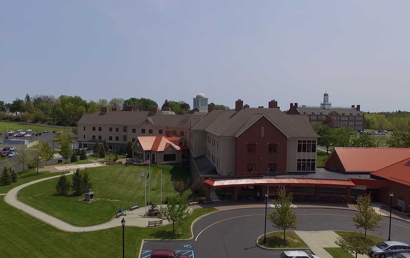 Aerial view of the FASNY Firefighter's Home campus with buildings and green space