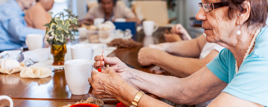 Residents engaged in a crafting activity