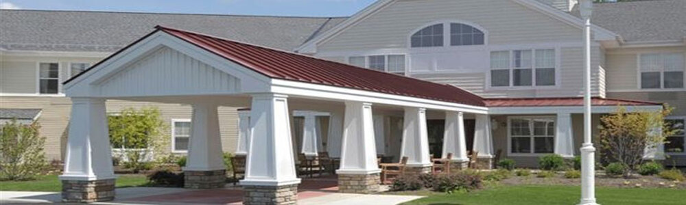 Exterior view of the facility entrance with covered walkway