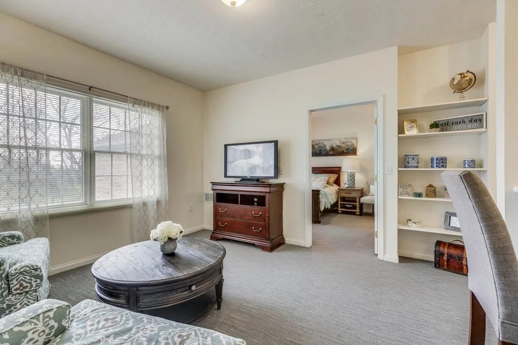 Cozy interior living space with a TV and bookshelf