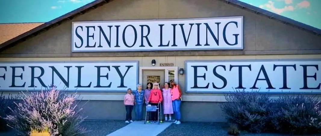 Residents and staff in front of Fernley Estates