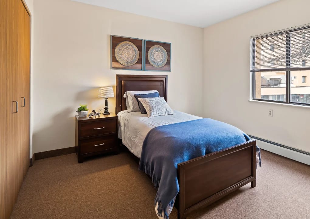 Cozy private resident room with a bed and decor
