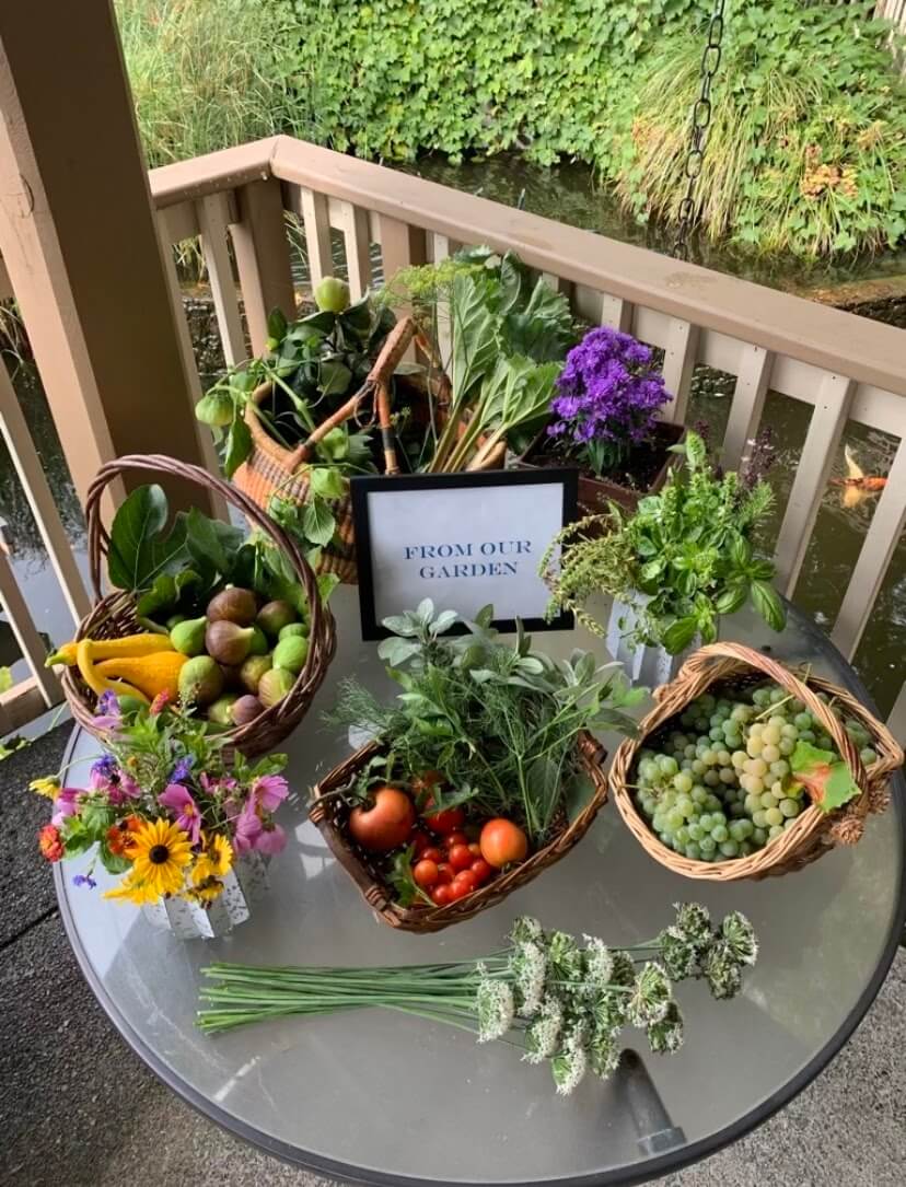 Baskets of fresh produce displayed in a garden