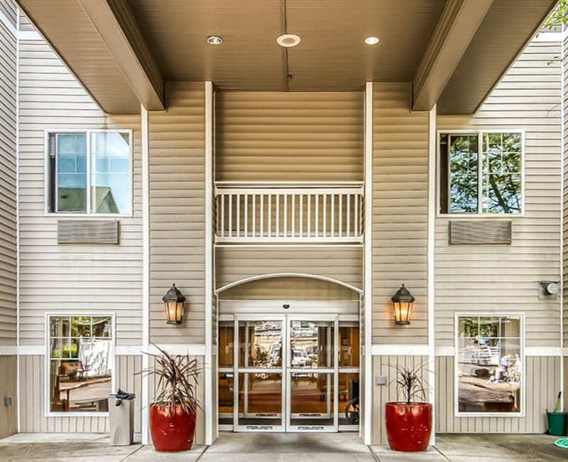 Exterior view of a modern assisted living facility entrance