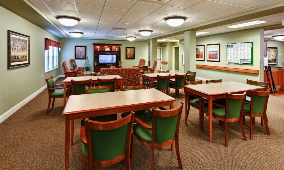 Bright common area with tables and seating