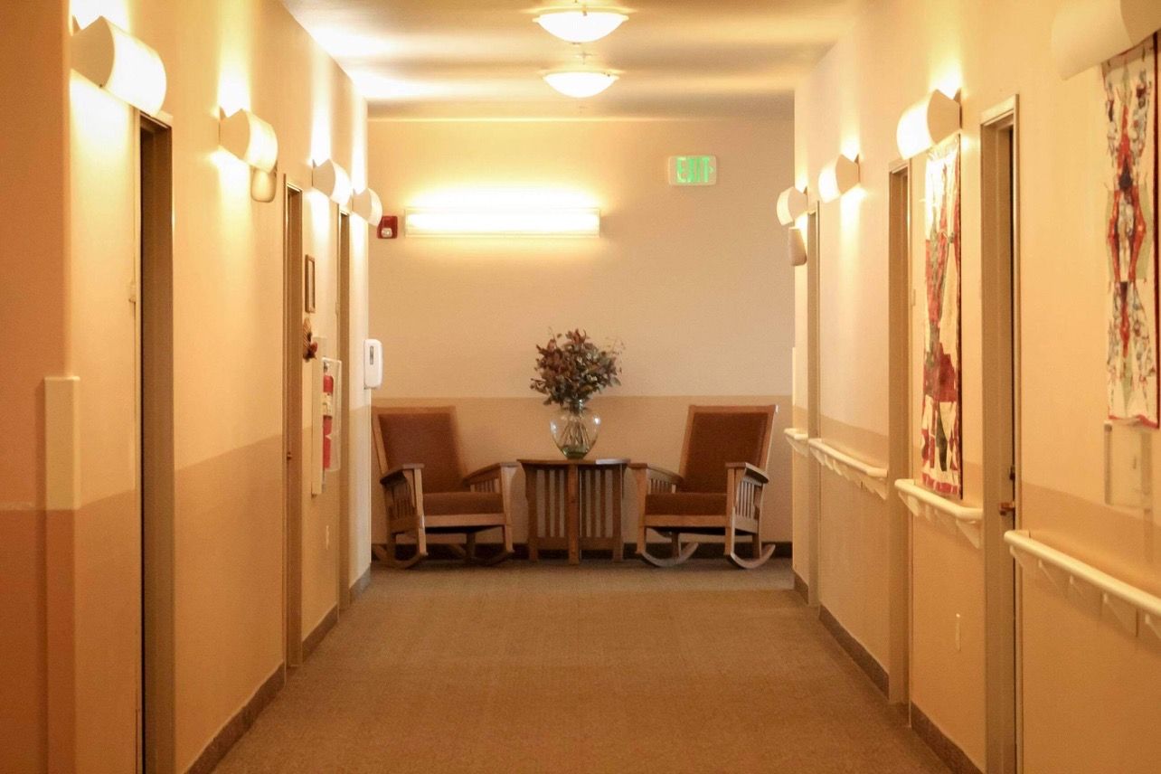 Hallway with seating area and decorative elements