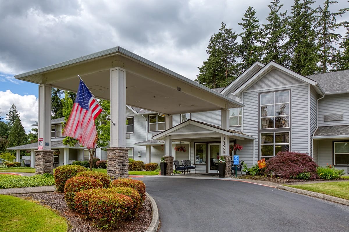 Exterior view of Homewood Assisted Living with landscaping