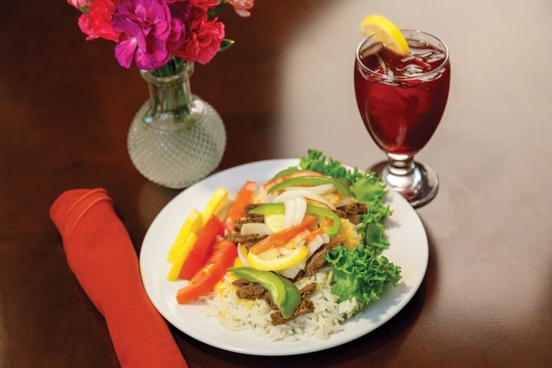 Delicious meal served with colorful vegetables and drink