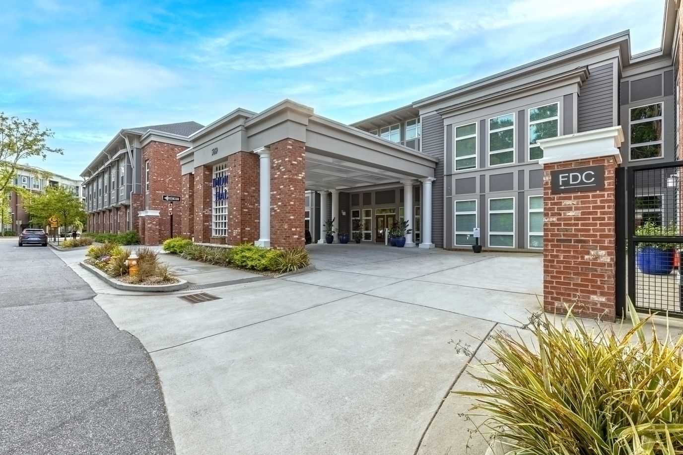 Exterior view of the facility entrance and surrounding area