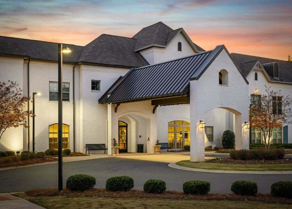 Exterior view of Somerby Edgewater facility at sunset