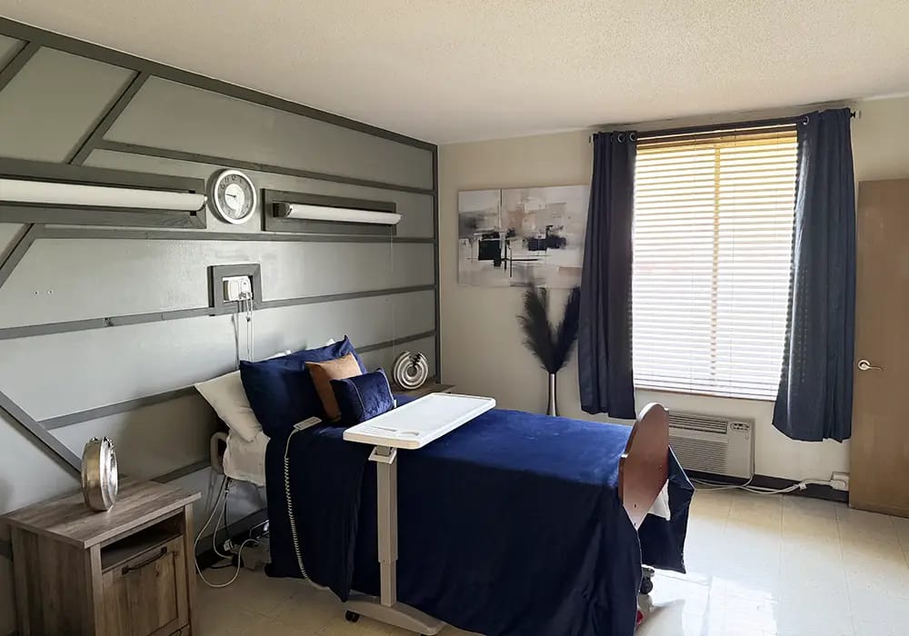 Private resident room with bed and window