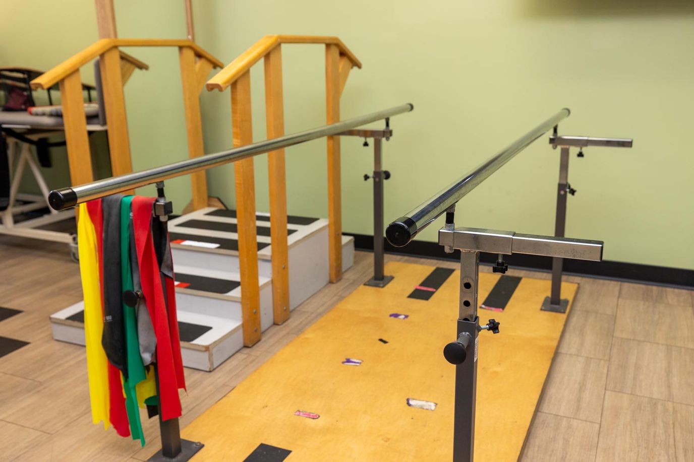 Physical therapy equipment with resistance bands in a rehab area