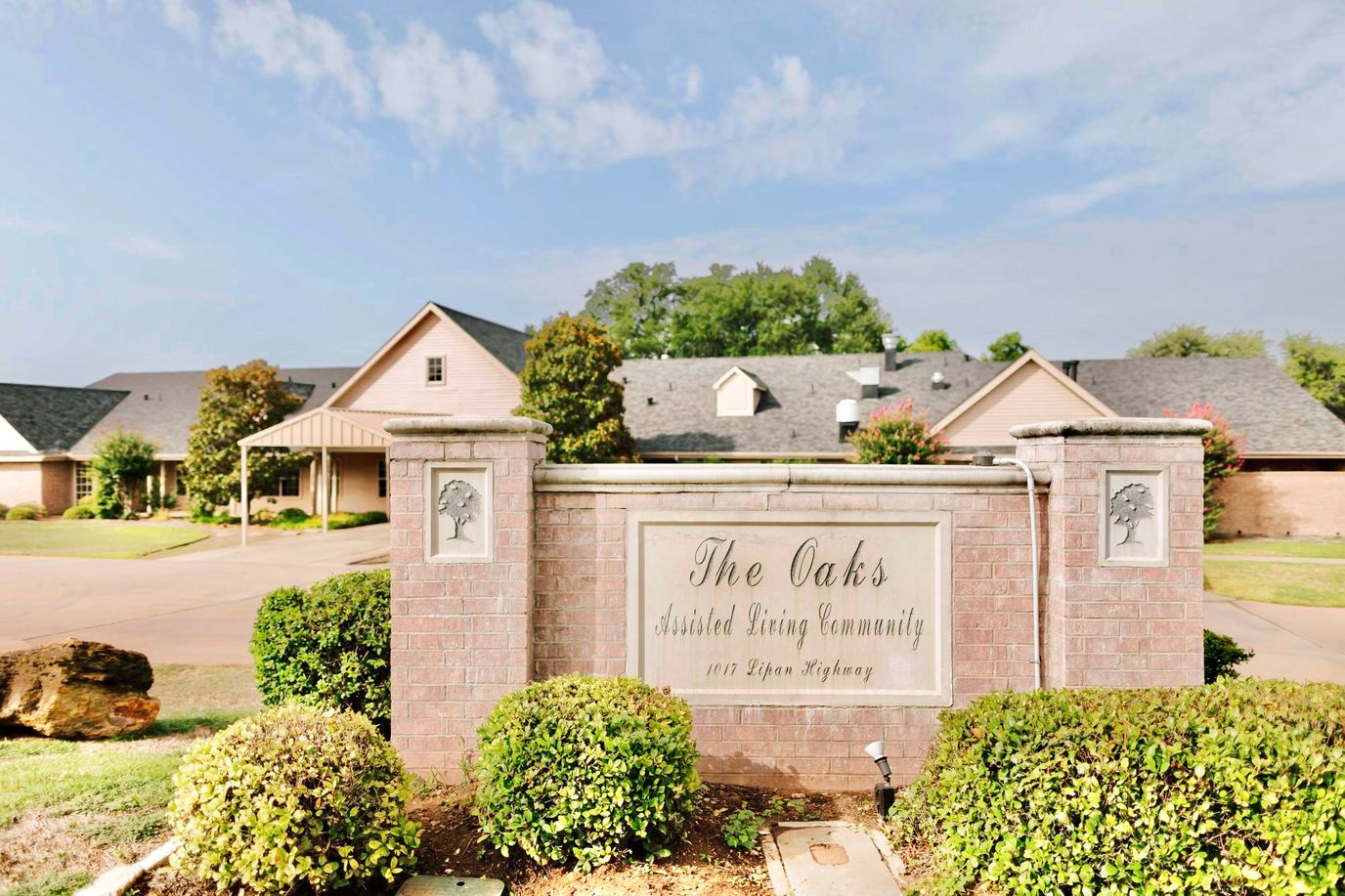 Entrance sign of The Oaks Assisted Living Community