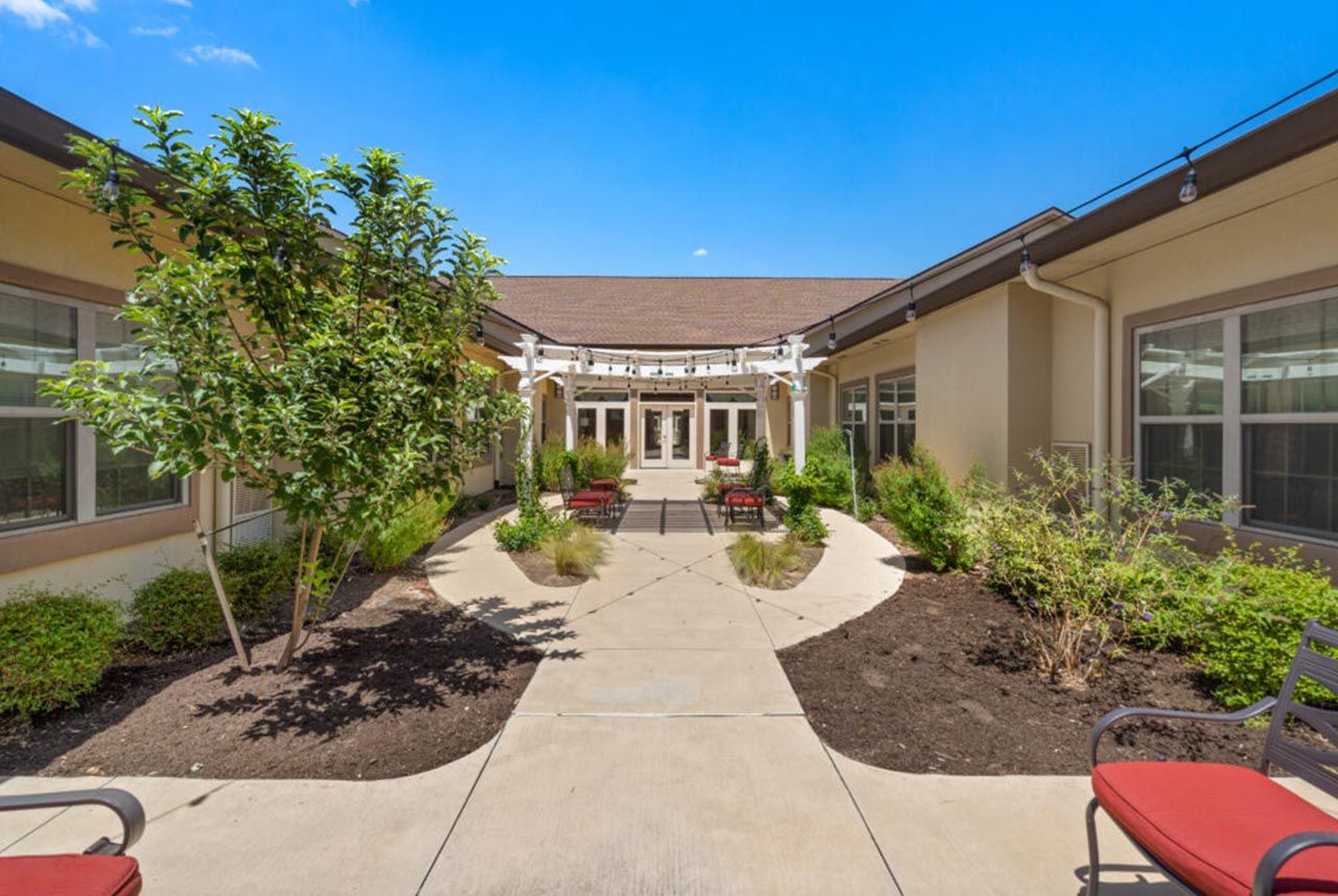 Beautiful outdoor courtyard with seating and landscaping