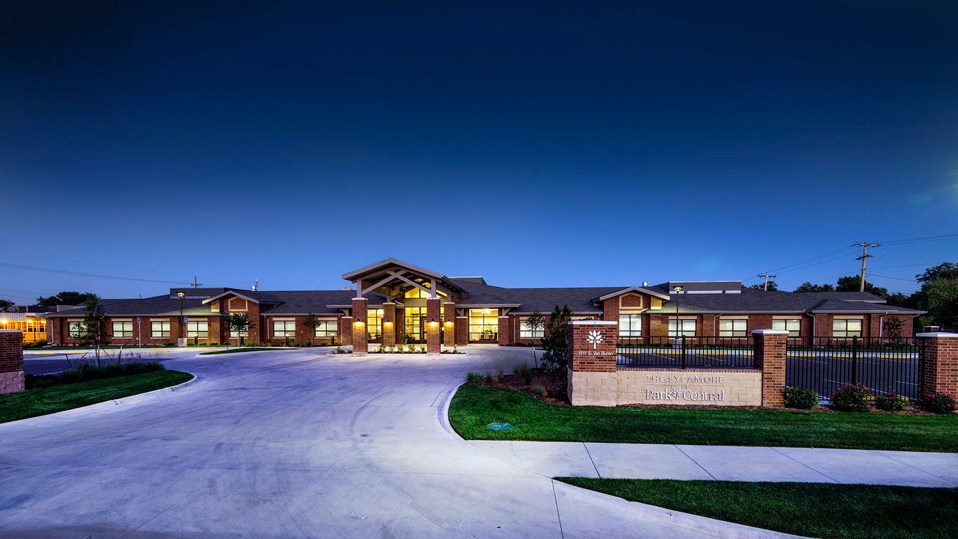 Exterior view of The Sycamore facility at twilight
